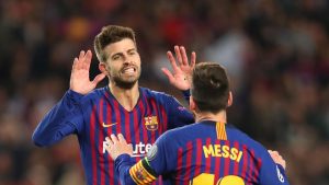 Gerard Pique i Lionel Messi Barcelona / Getty Images